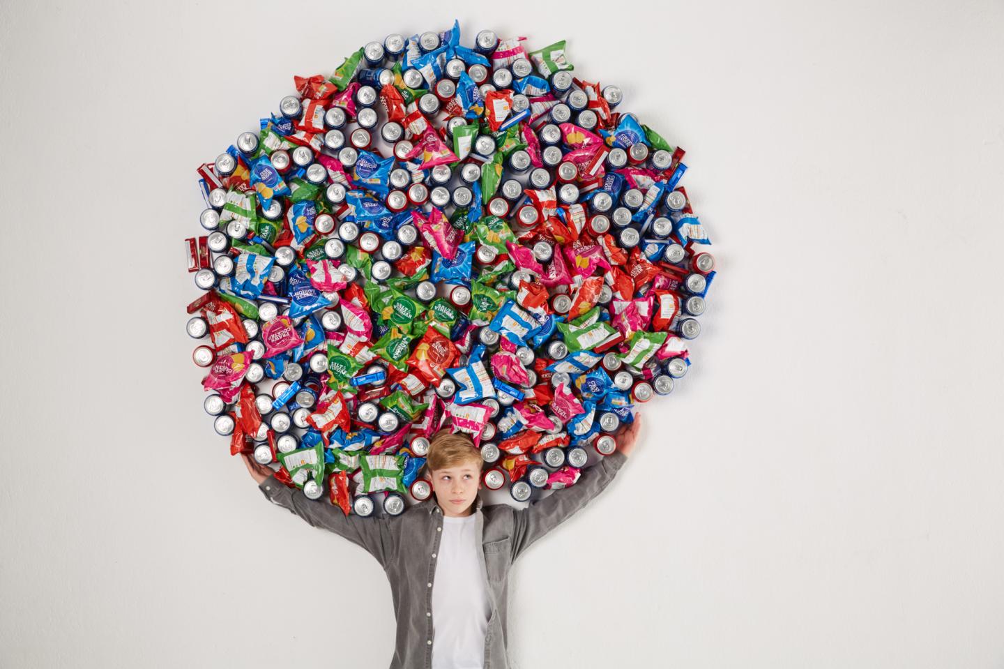 Young People in the UK Could Eat 500 Extra Junk Food Snacks if they Watch a lot of Commercial TV