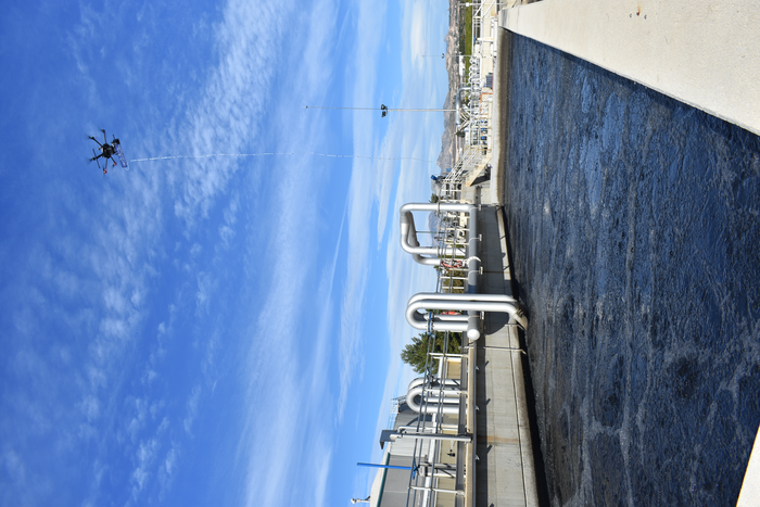 An electronic nose on a drone collecting air for odor measurement