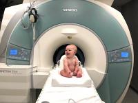 A baby with the fMRI scanner