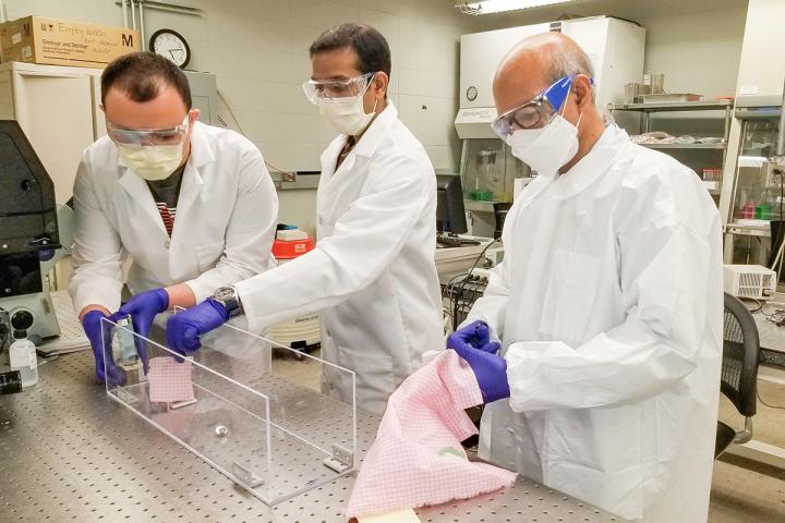 Researchers test common household fabrics used to make masks to help stop the spread of the coronavirus.