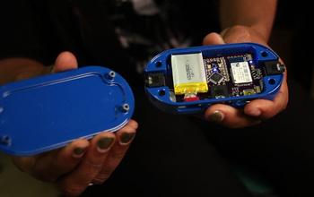 Hands Holding a Computer Input Device