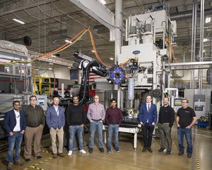 Researchers pictured here at the DOE Manufacturing Demonstration Facility at ORNL developed the R&D 100 Award-winning hybrid additive manufacturing-compression molding, or AM-CM, technology.