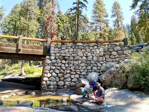 Hydrologists sampling in the Sierras