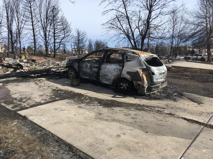 A car left in the ashes