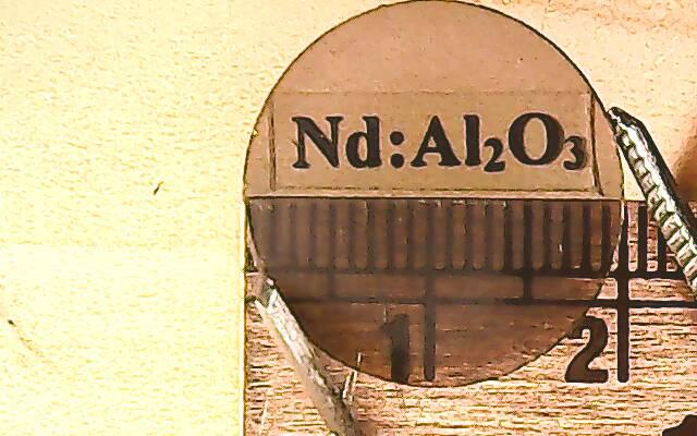 Neodymium-Alumina Laser Gain Material