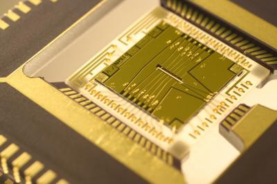 Semi-Conductor Chip Used in First Scalable 3-D Ion Microtrap Development