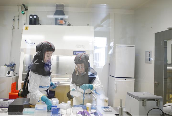 Lab workers in high-biosafety lab