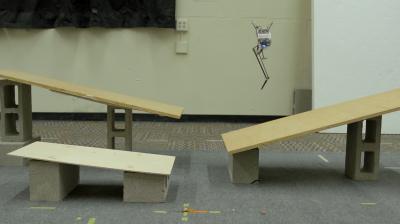 Salto the Jumping Robot Navigates Obstacles