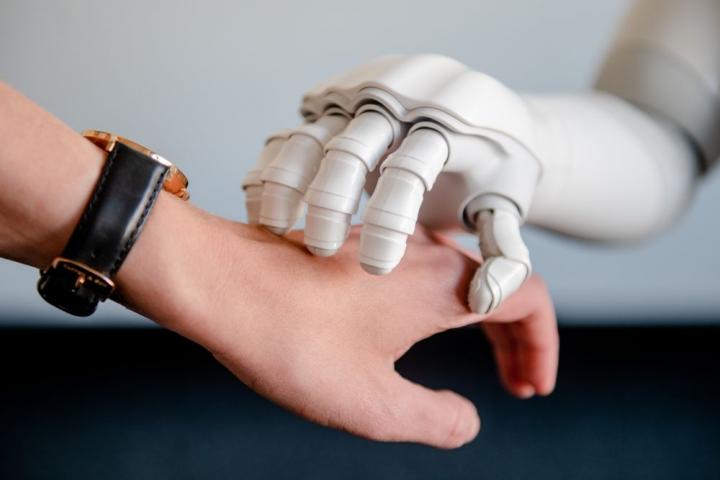 A touch from a conversing robot is linked to positive emotional state