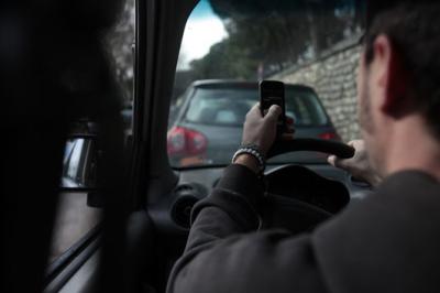 Answering Messages behind the Wheel Is as Dangerous as Being Twice Over the Limit