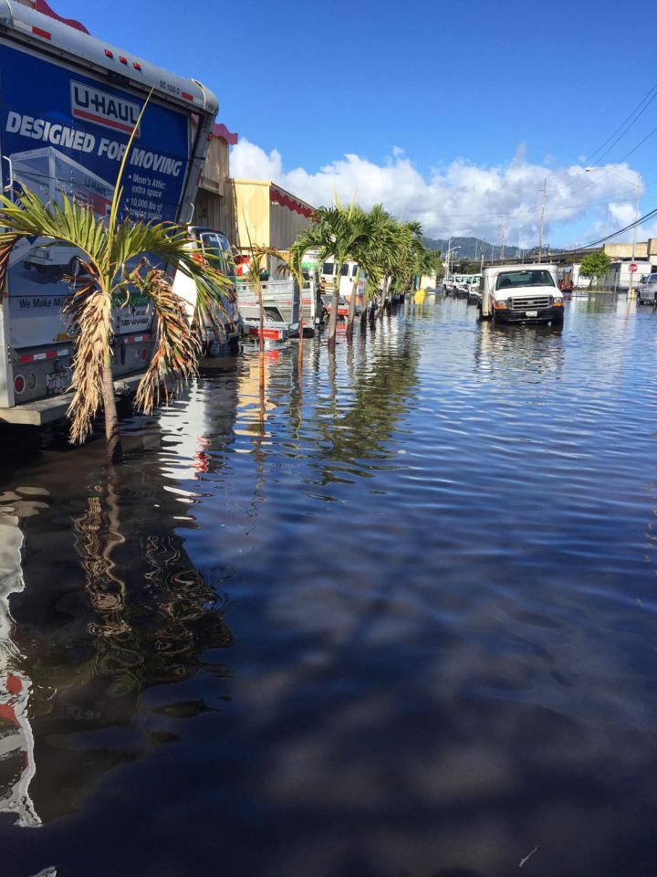 Moving vans in flooded area