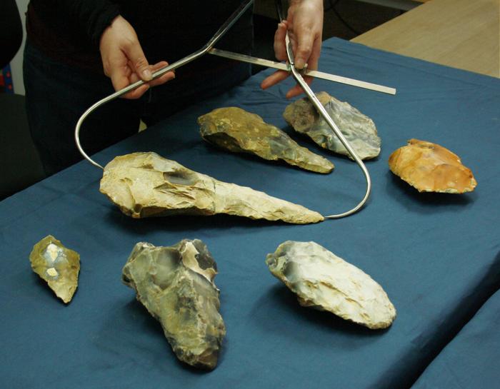 ASE Senior Archaeologist Letty Ingrey measures the largest giant handaxe