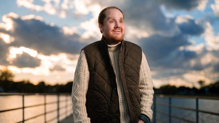 Derek Pfaff standing at pier after his face transplant