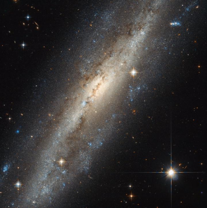 Barred Spiral Galaxy NGC 7640