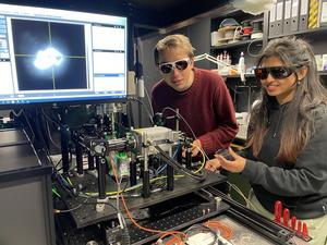 Sam Scholten and Priya Singh working on a hBN quantum sensing system