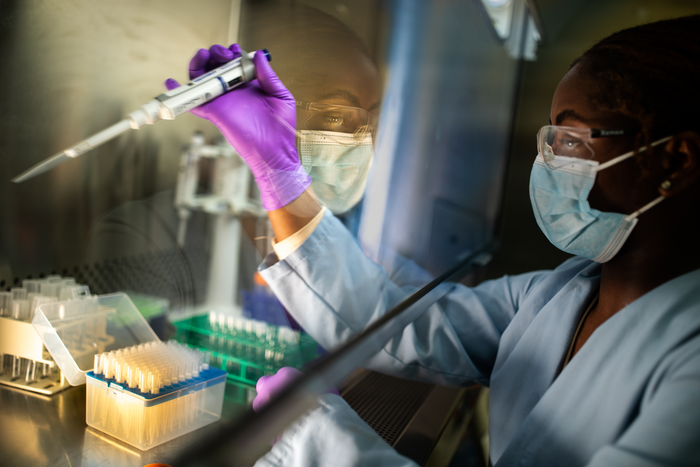 HBCU Sandia intern prepares research sample.