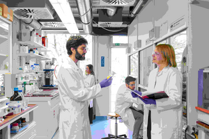 Group Leader in Chemical Proteomics, Dr. Guillaume Médard, and his research group in the lab.