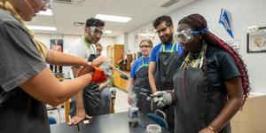 Students learning quantum principles at a Quantum for All camp