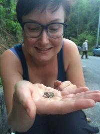 Sarah Brozio holds Tungara Frog
