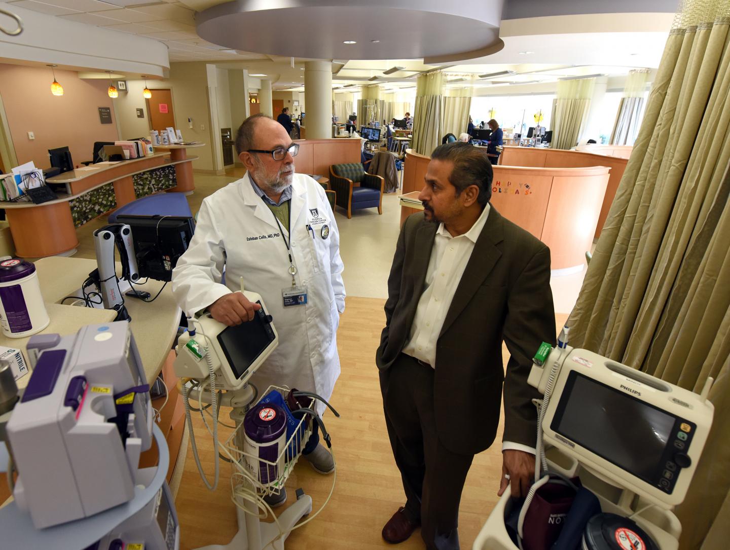 Drs. Esteban Celis (left) and Sharad Ghamande