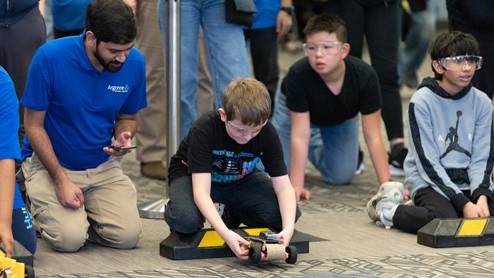 Students Competing in Middle School Electric Car Competition