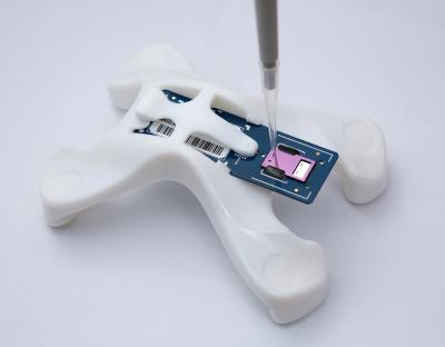 Photo of Inserting Samples into the Veretroptm Chip