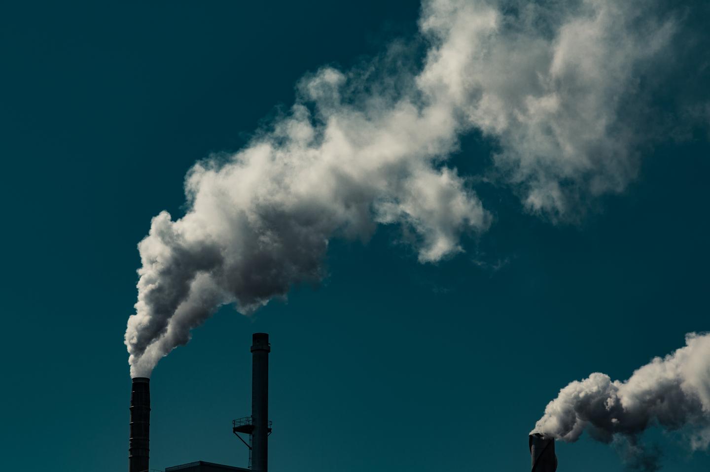 Smoke Stacks Release Emissions into the Atmosphere