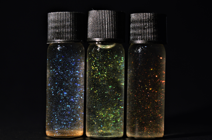 RGB Glitter in vials prepared from peeled large-scale films