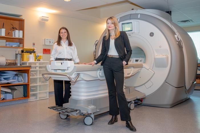Researchers with 3T MRI scanner