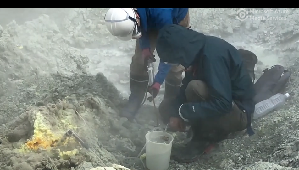 Collecting volcanic gas samples at a fumarole