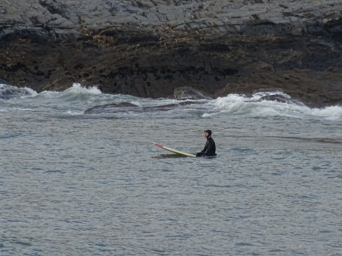 Dr Bob Brewin on his surfboard