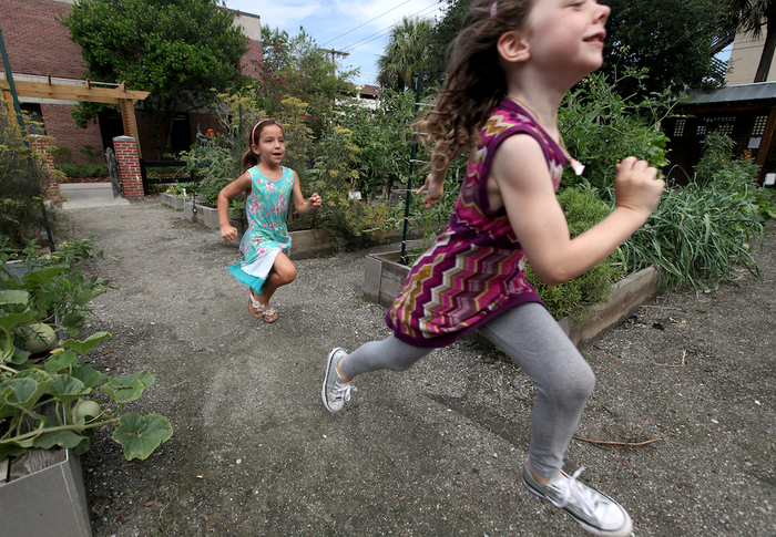 Children playing in a garden