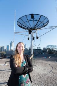 Mariel Borowitz With Satellite Downlink Dish (Vertical)