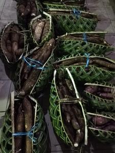 Yams in baskets for sale at the Port Vila markets, Vanuatu