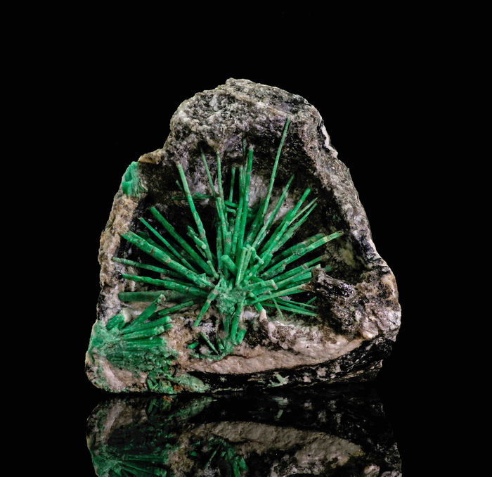 Unique environments create distinctive red, pink, blue, and green "kinds" of the mineral beryl, among them emerald