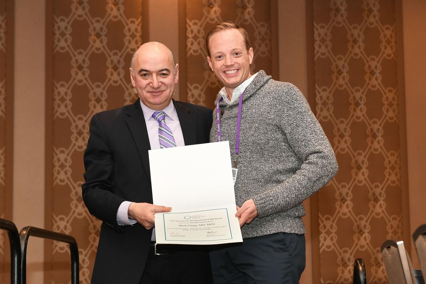 Dr. Mark Clapp Receives Award from Dr. George Saade