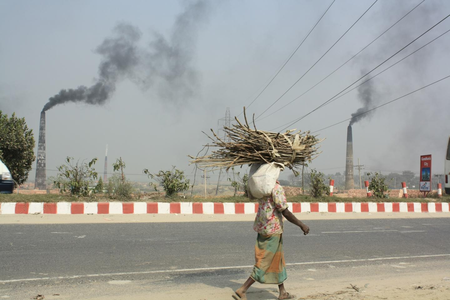 Brick Kiln and Person Walking