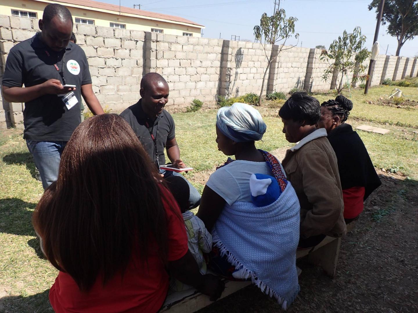 Research assistants administering the health-related quality of life survey to mothers from Kabwe