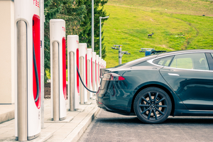 A car charging at a Tesla Supercharger