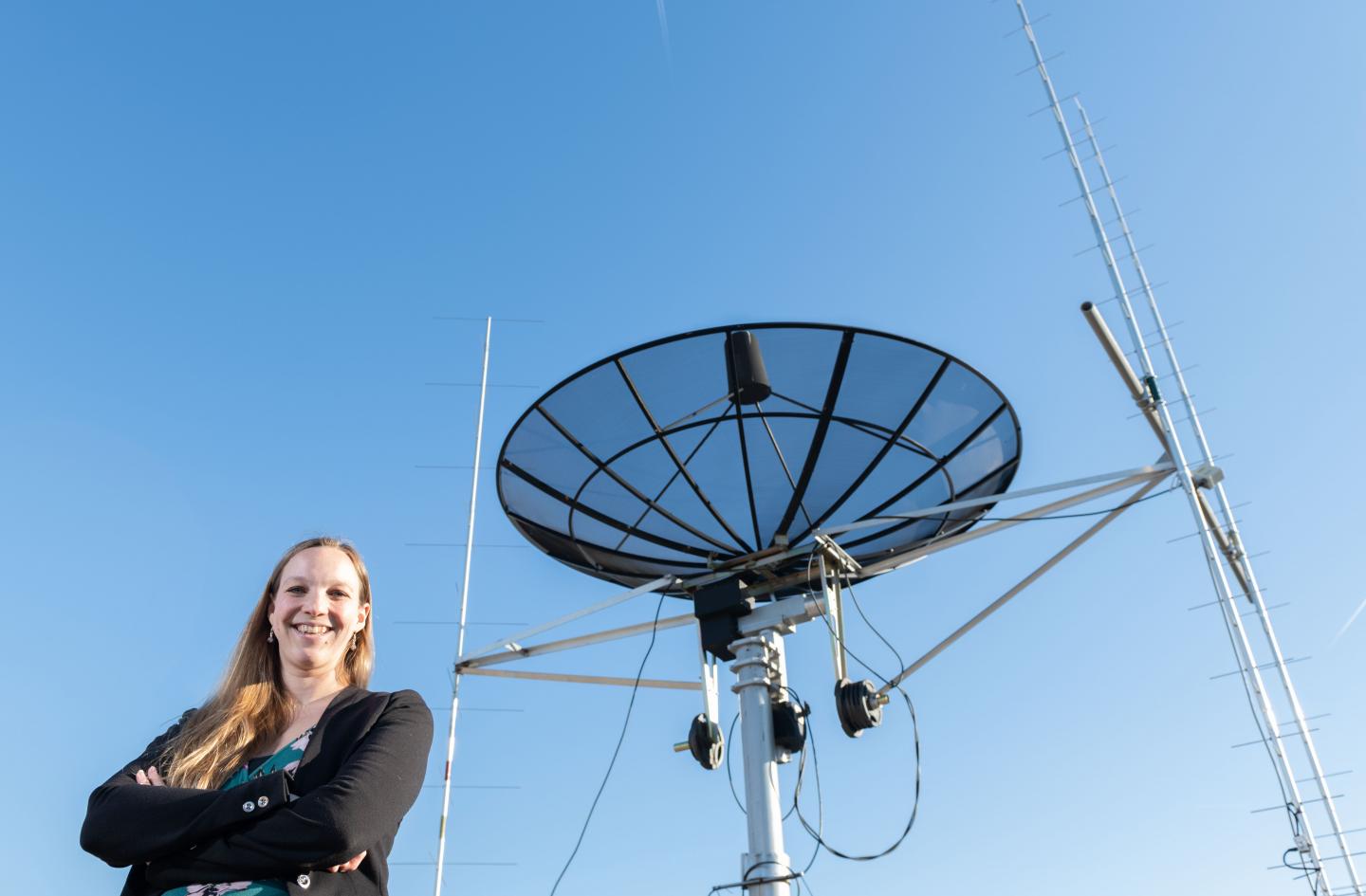 Mariel Borowitz with Satellite Downlink Dish