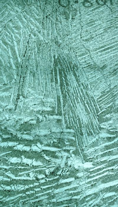 Parallel Platy Olivine Crystals