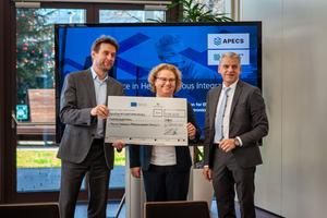 Cheque handover APECS funding