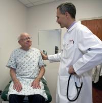 Dr. Josef Stehlik with a Patient