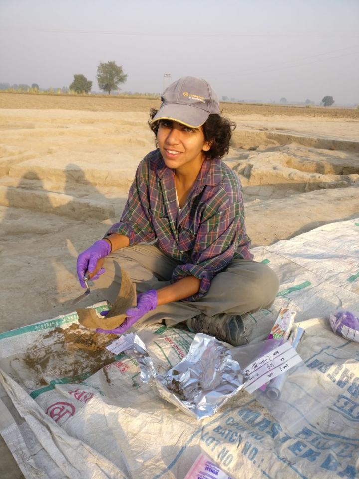 Lead author Akshyeta Suryanarayan sampling pottery for residue analysis in the field.