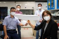 NTU scientists and their nanotech mask coated with copper nanoparticles to block and kill 99.9% of germs