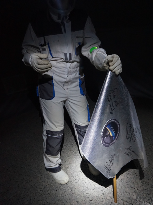 Analog astronaut performing an EVA in the LunAres EVA yard.