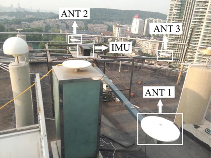 The experimental platform of high-rate GNSS gyroscopes with the three Trimble Net R9 antennas and the inertial measurement unit IMU-NV-LINS812.