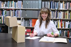 UNF student working in Library archives