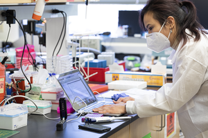 University of Washington researcher working in lab