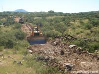 Bulldozers Remove a Vehicle Barrier in Buenos Aires National Wildlife Refuge to Make Way